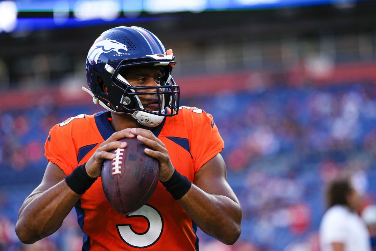 Denver Broncos QB Russell Wilson warms up before preseason game, Aug. 27, 2022