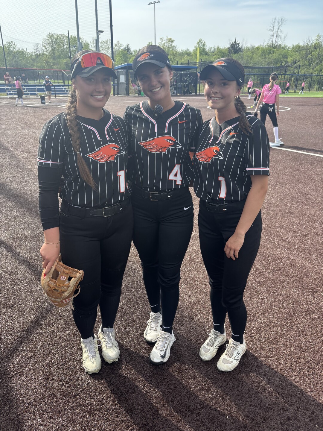 Alivia Fischer, Savanna Voss and Jenna Martin play softball for Hartford Union High School