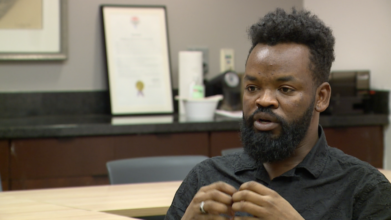 Souleymane Adam, volunteer manager at JVS and former refugee - .png