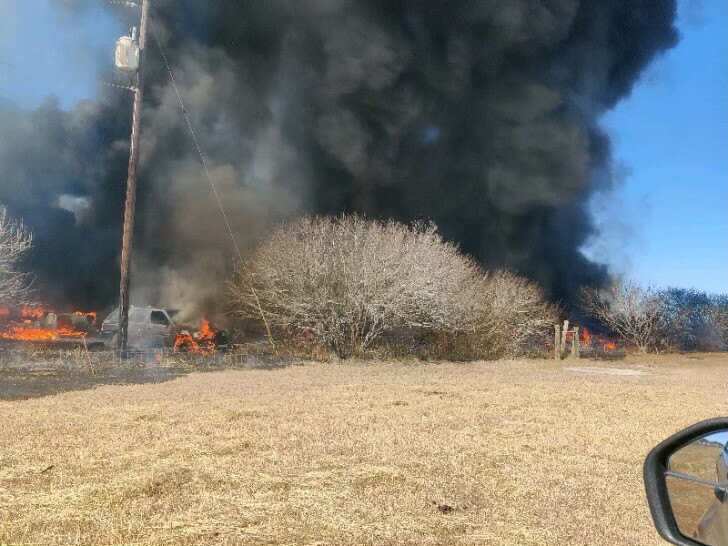 Odem Fire with light poles, car