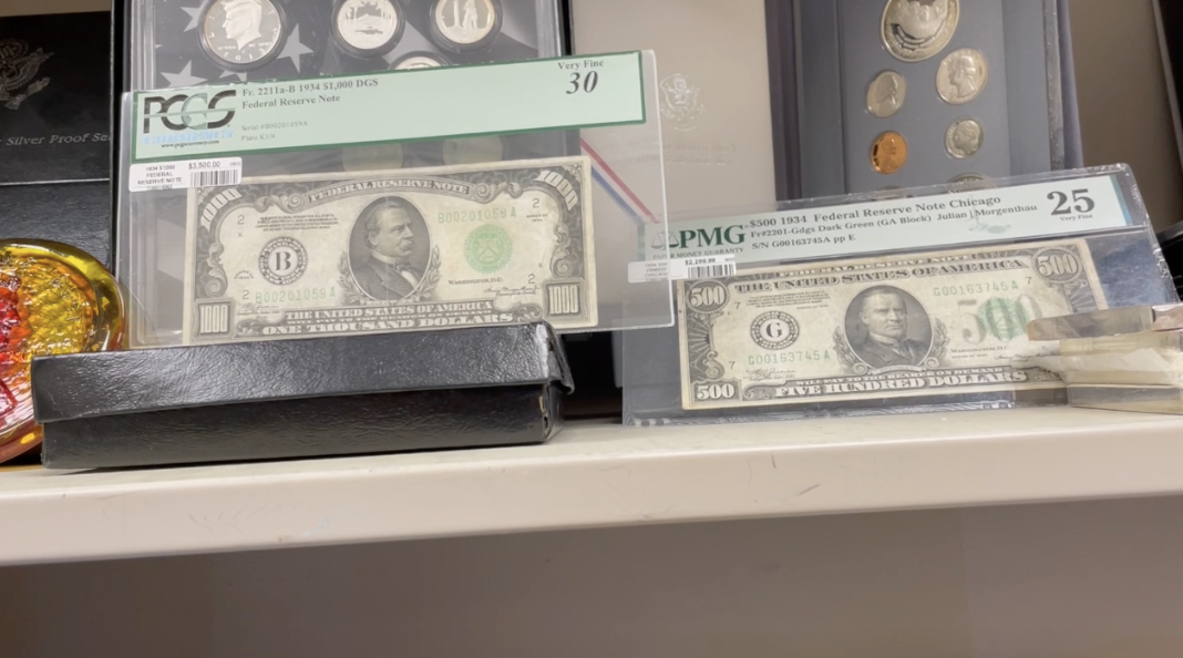 A vintage $500 bill and $1000 bill on display at David's Jewelry & Coin Exchange in College Station, Texas