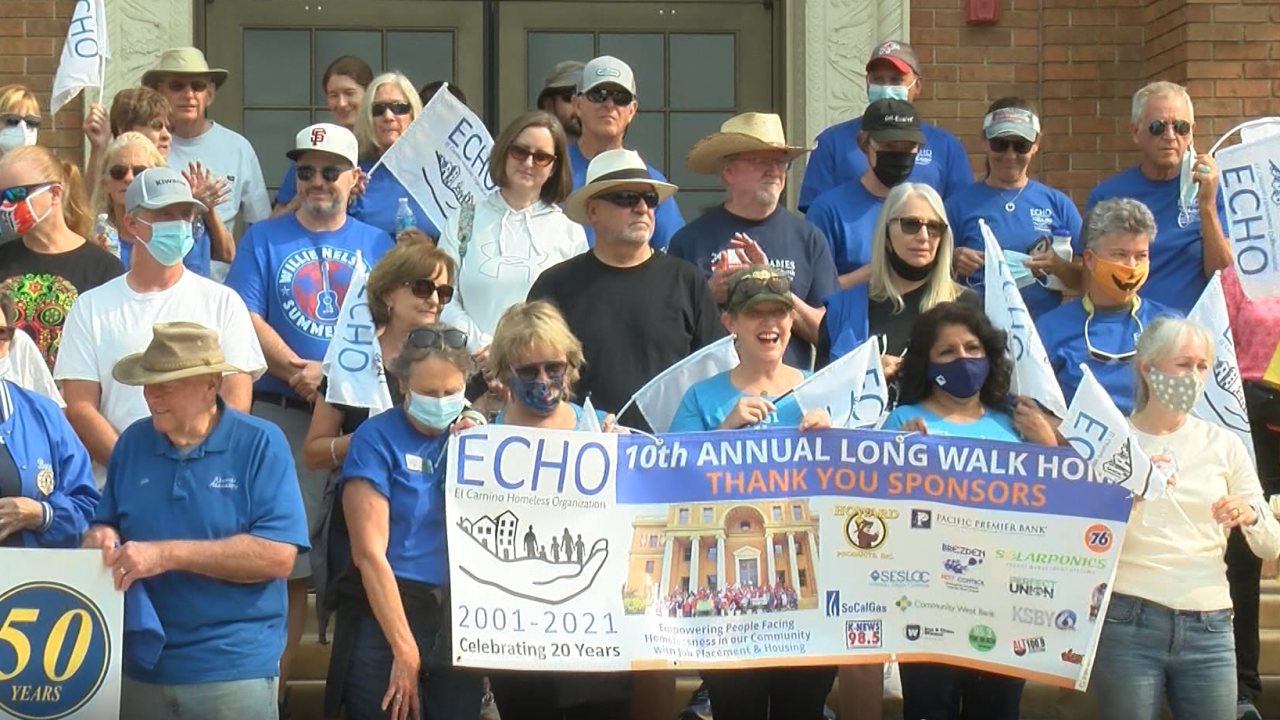 Volunteers put on their walking shoes to show their support for those who are unhoused.