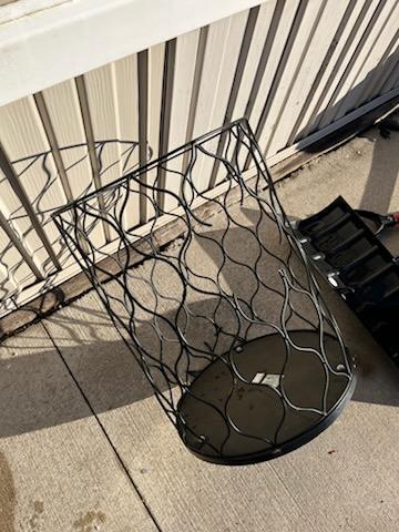 10-week-old Burmese Mountain Dog, Jemmy, got stuck in a wrought iron table base