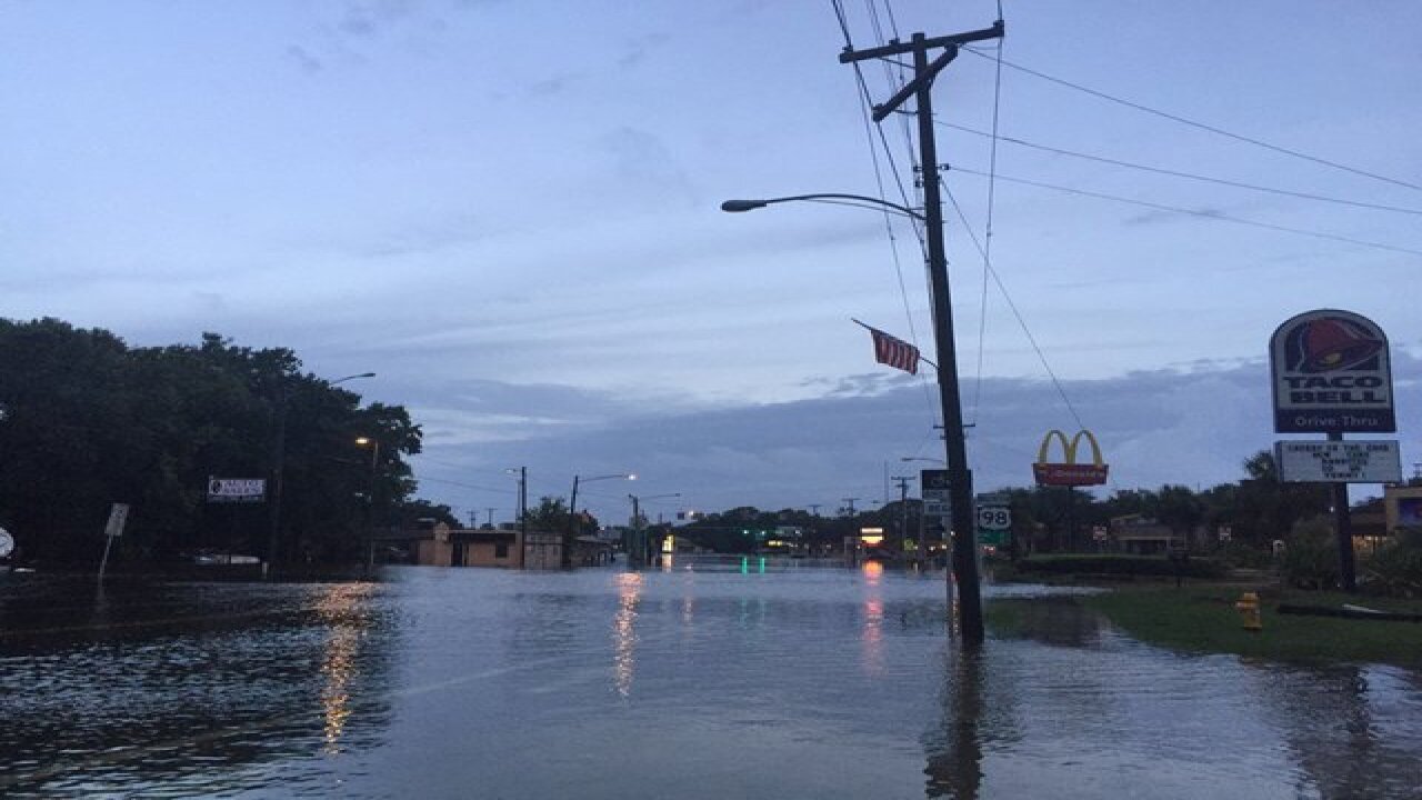 PHOTOS | Tropical system causing flooding