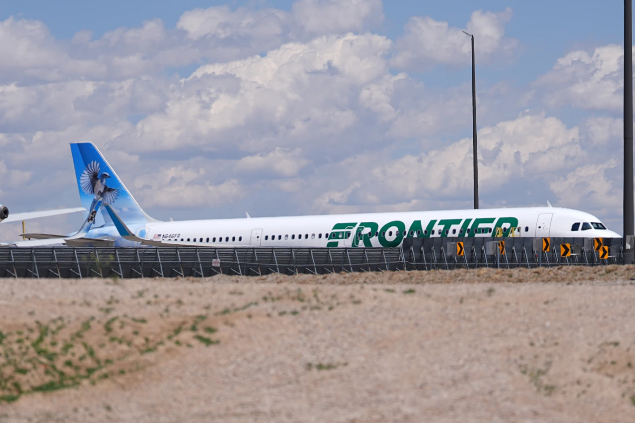Frontier Airlines jetliner number n646fr sits outside the airlines' technical operations center with other jetliners in for service north of Denver International Airport Saturday, May 9, 2026, in Denver.