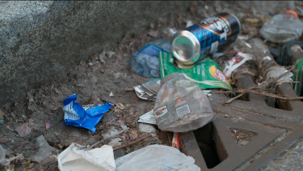 Residents complain about trash outside the St. Francis Seraph Church in north Over-the-Rhine.