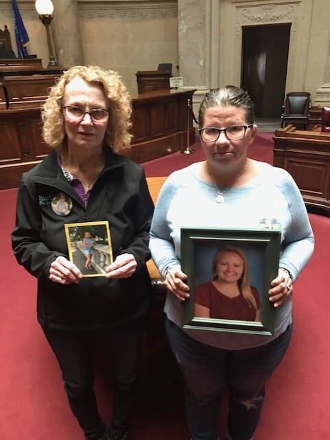 Claudia Church and Dawn Church hold pictures of Hannah Abagail Mae Church.