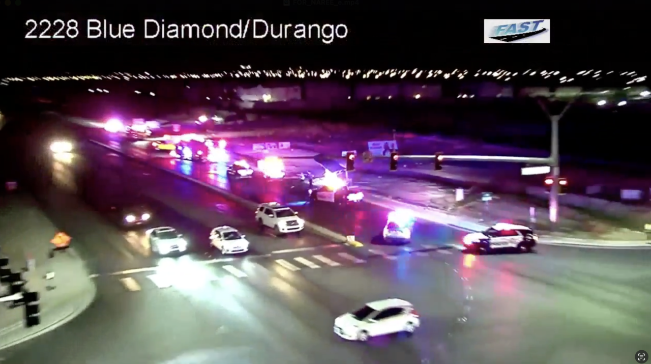 Police presence blocks lanes on westbound Blue Diamond Road at Durango Road
