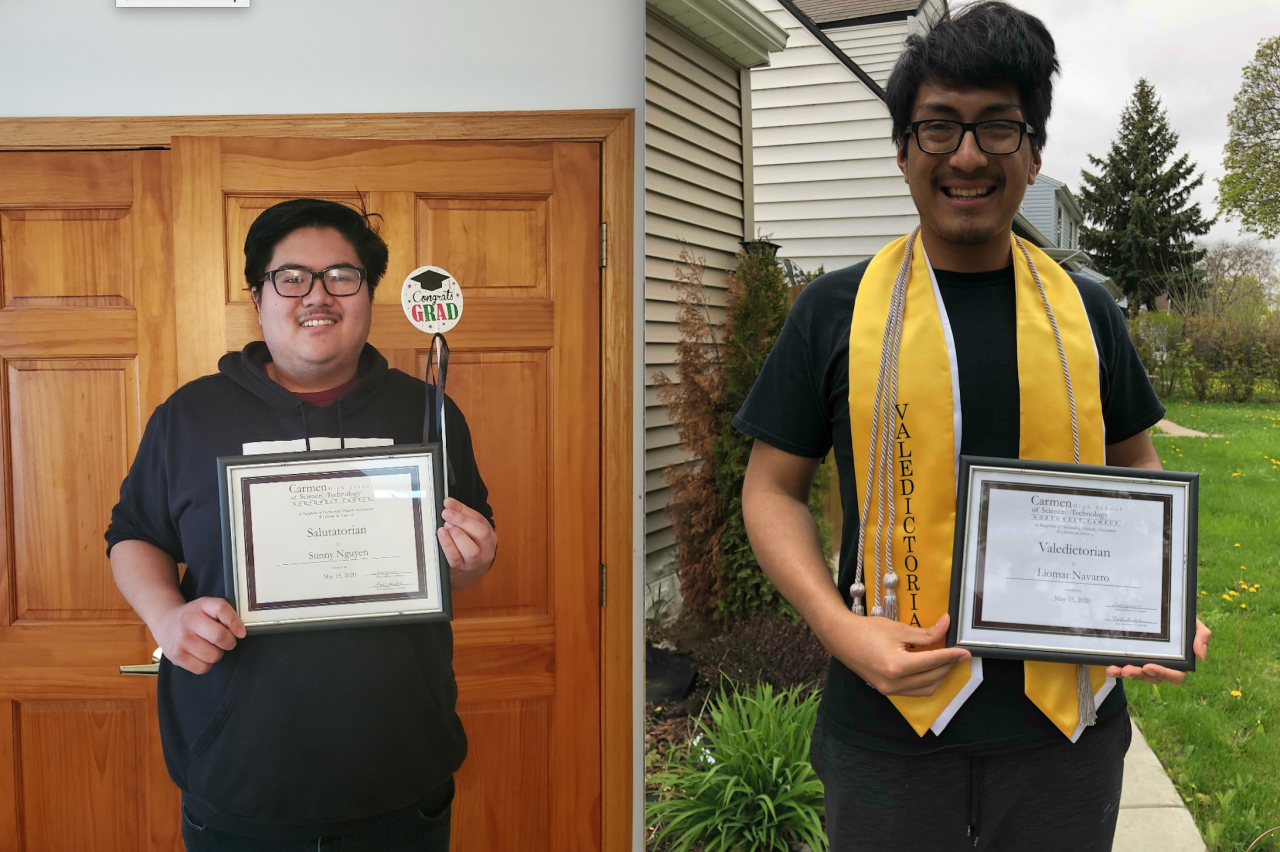 Sunny Nguyen (left) and Lio Navarro (right) holding their certificates for their outstanding academic achievements.