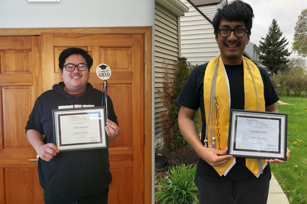 Sunny Nguyen (left) and Lio Navarro (right) holding their certificates for their outstanding academic achievements. 