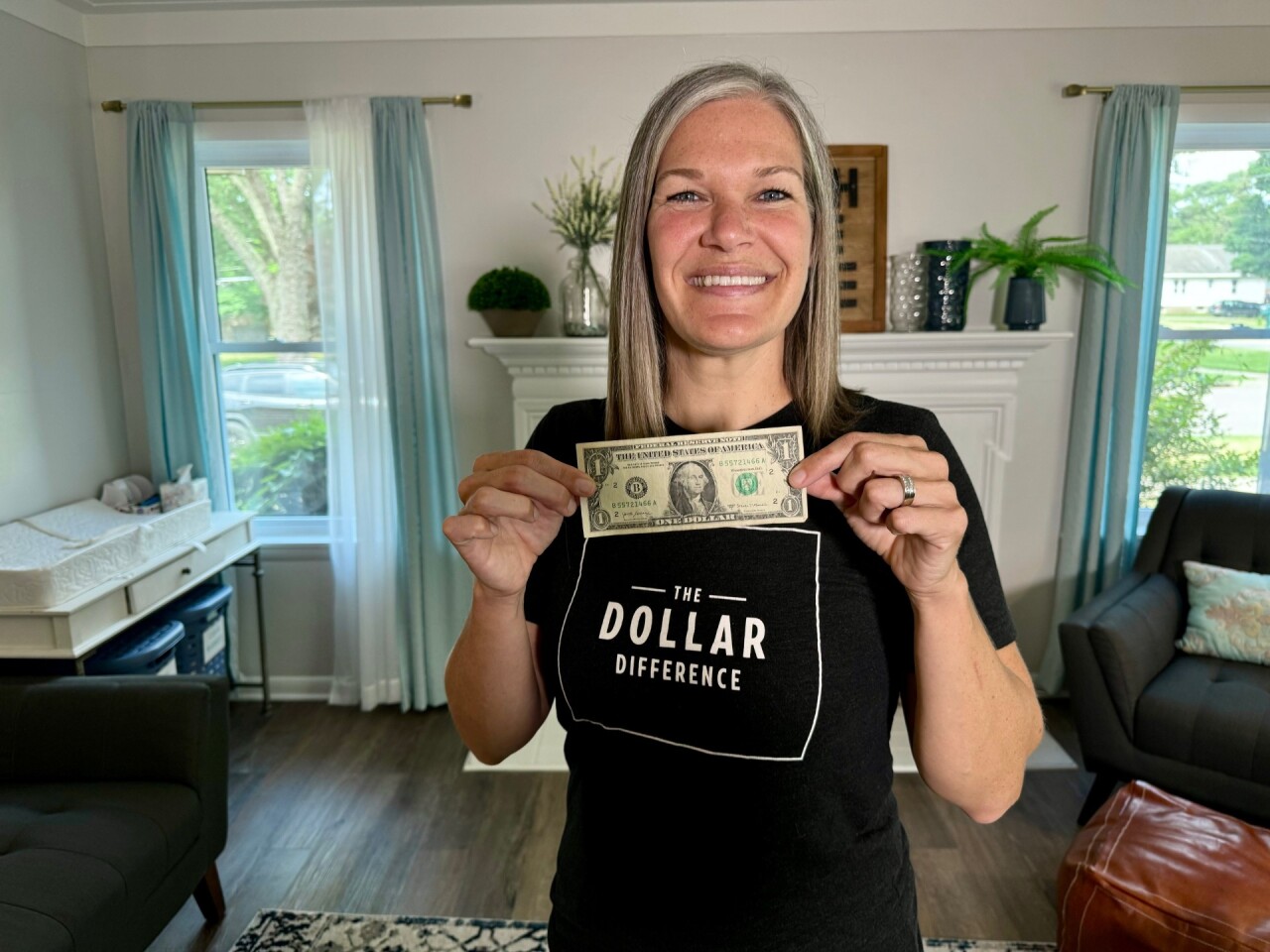 stacey with dollar.jpg