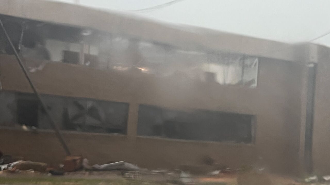 Strong winds damaged an office building on Fourth Street in Menasha Monday afternoon 