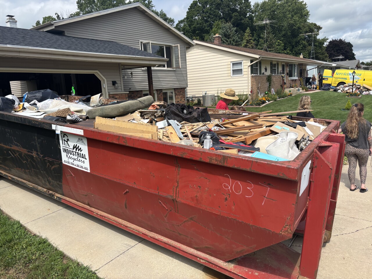 West Bend residents struggle with flood cleanup as basements remain destroyed