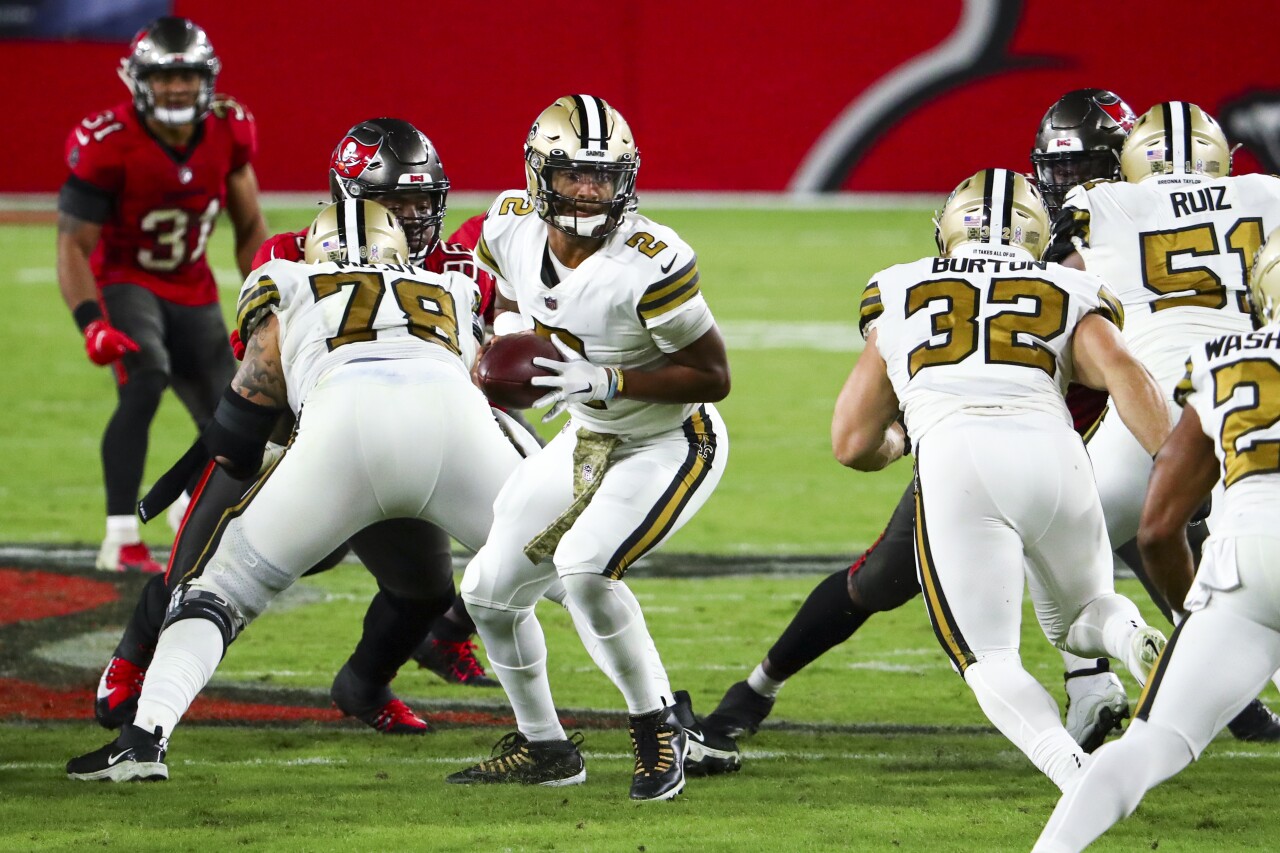 New Orleans Saints QB Jameis Winston hands off football at Tampa Bay Buccaneers in 2020