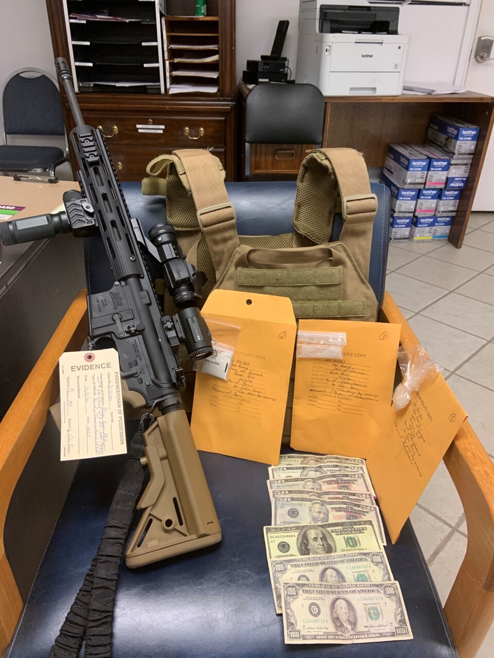 gun, vest and counterfeit bills 10-9.jpg