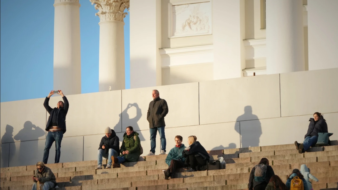eople enjoy the sunny weather with the Helsinki Cathedral of the background in Helsinki, Finland, Friday, Nov. 14, 2025.