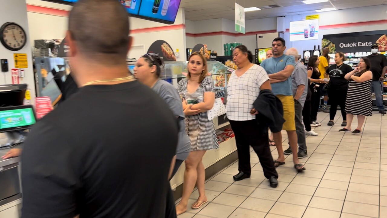 Line for Mega Millions tickets at a 7-Eleven in Denver