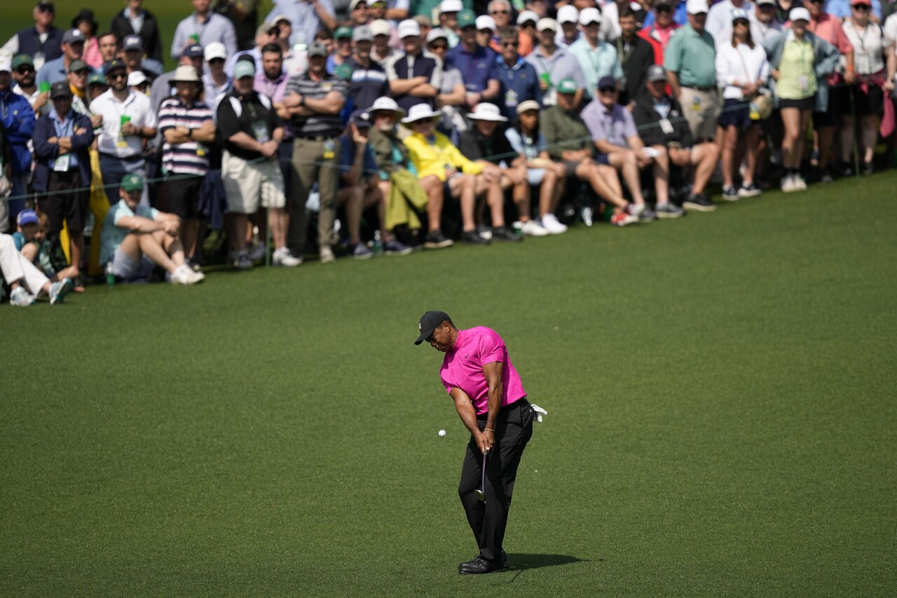 Tiger Woods chips to second green during first round of 2022 Masters