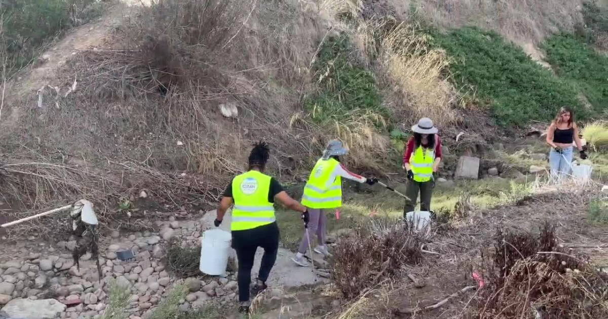 San Diego residents clean storm drains and clear streets to prepare for a possibly wet El Niño winter