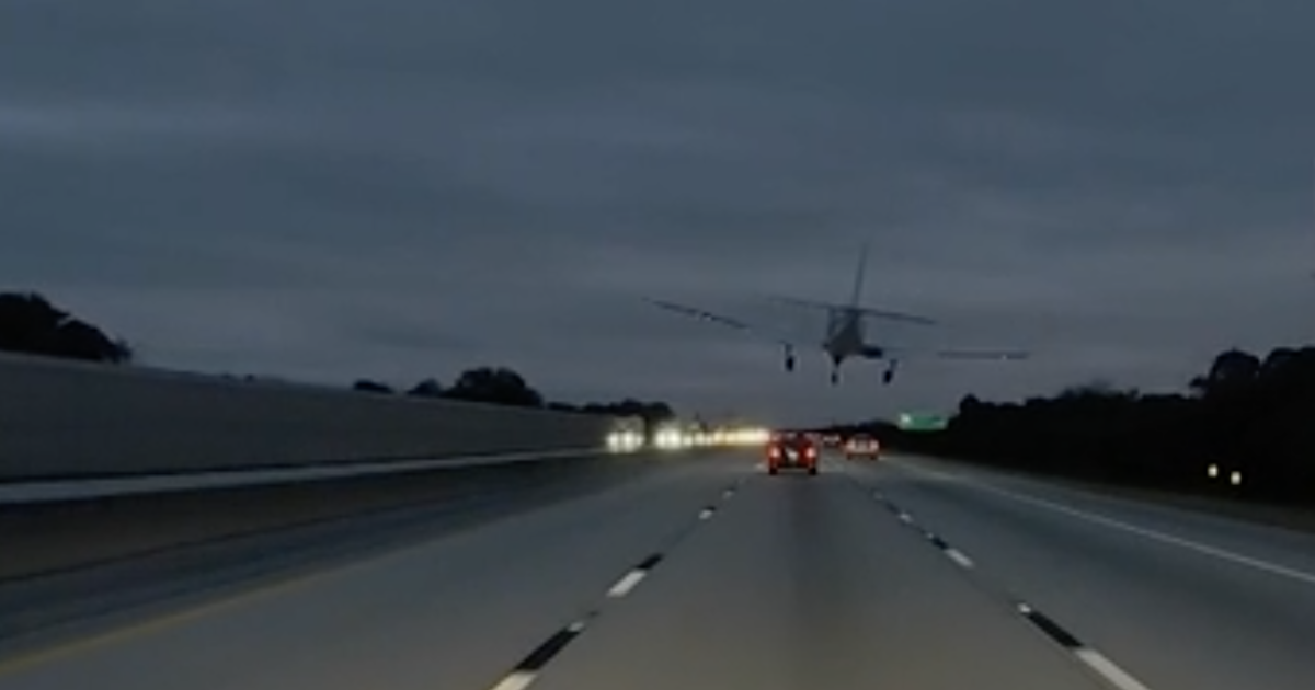 Driver hurt after plane lands on car on Florida freeway