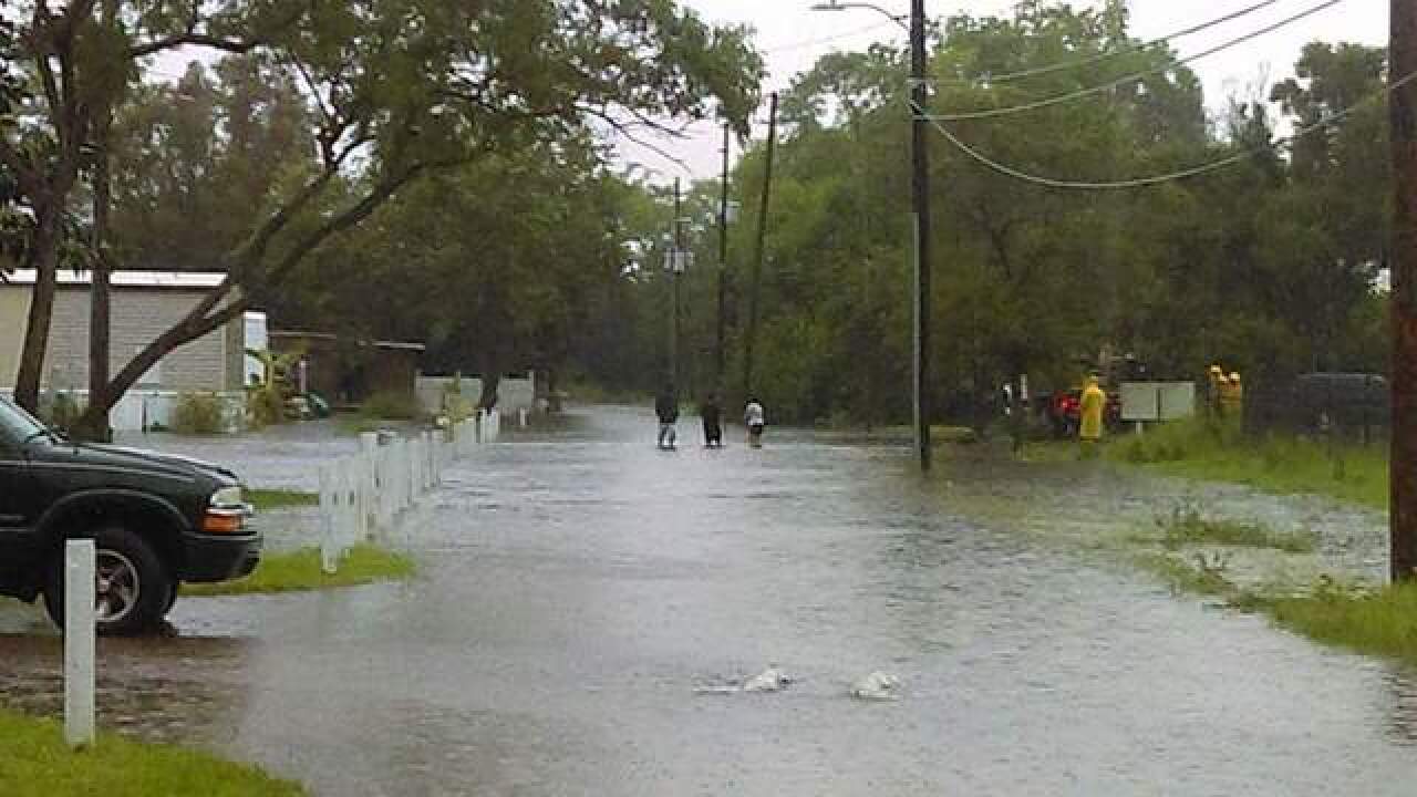 PHOTOS | Tropical system causing flooding
