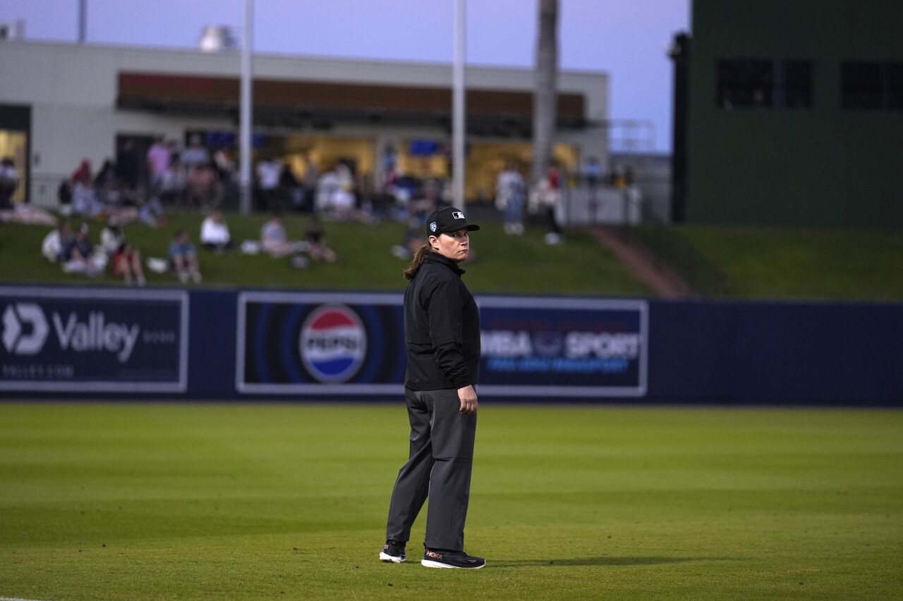 Umpire Jen Pawol looks back from third base during spring training game between Washington Nationals and Houston Astros, Feb. 24, 2024