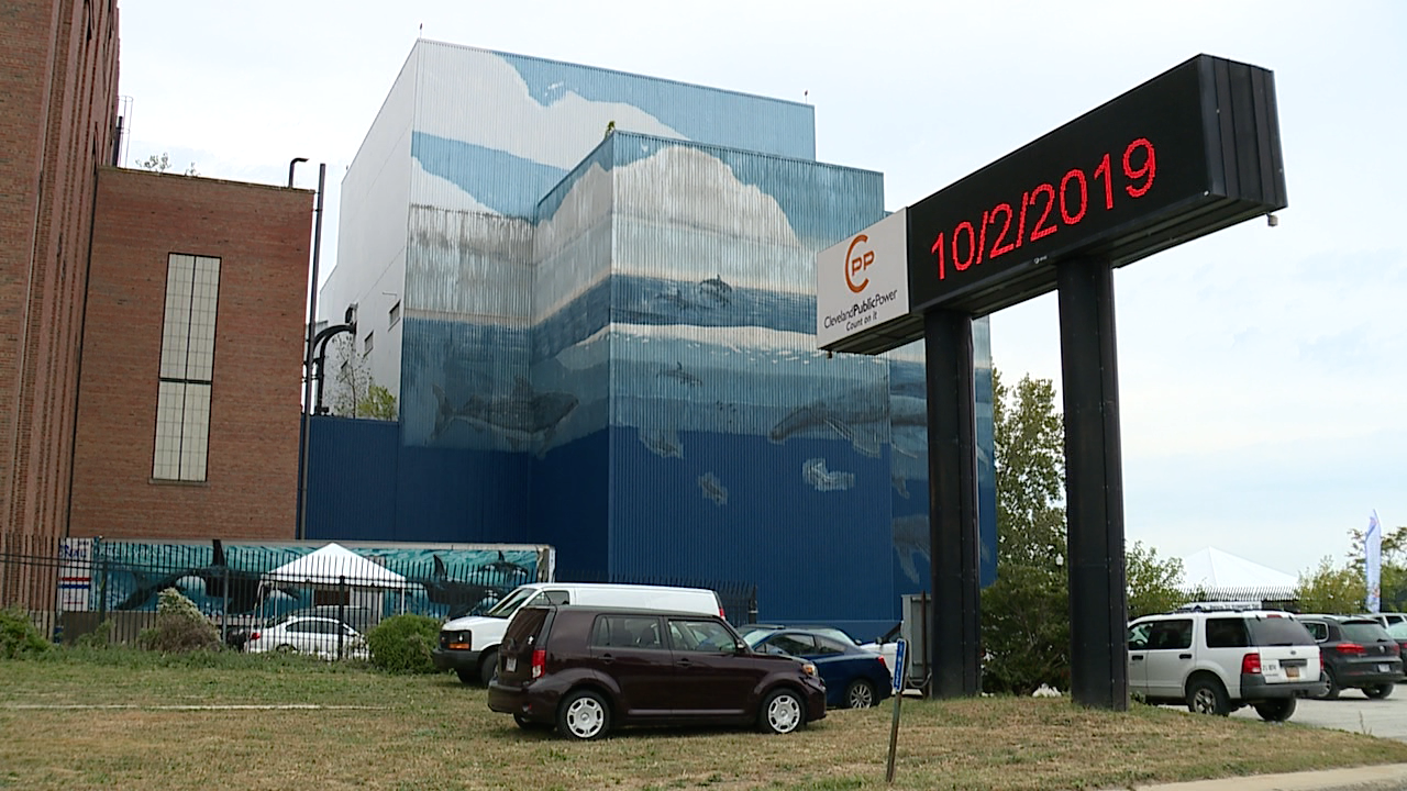 Artist restores Cleveland's 'Whale Wall' after more than two decades