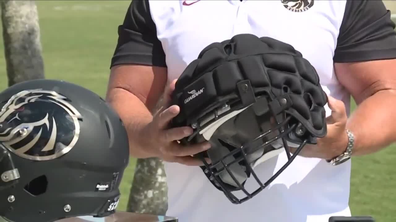 Guardian football helmet safety caps being used by Jupiter Mustangs Pop Warner team