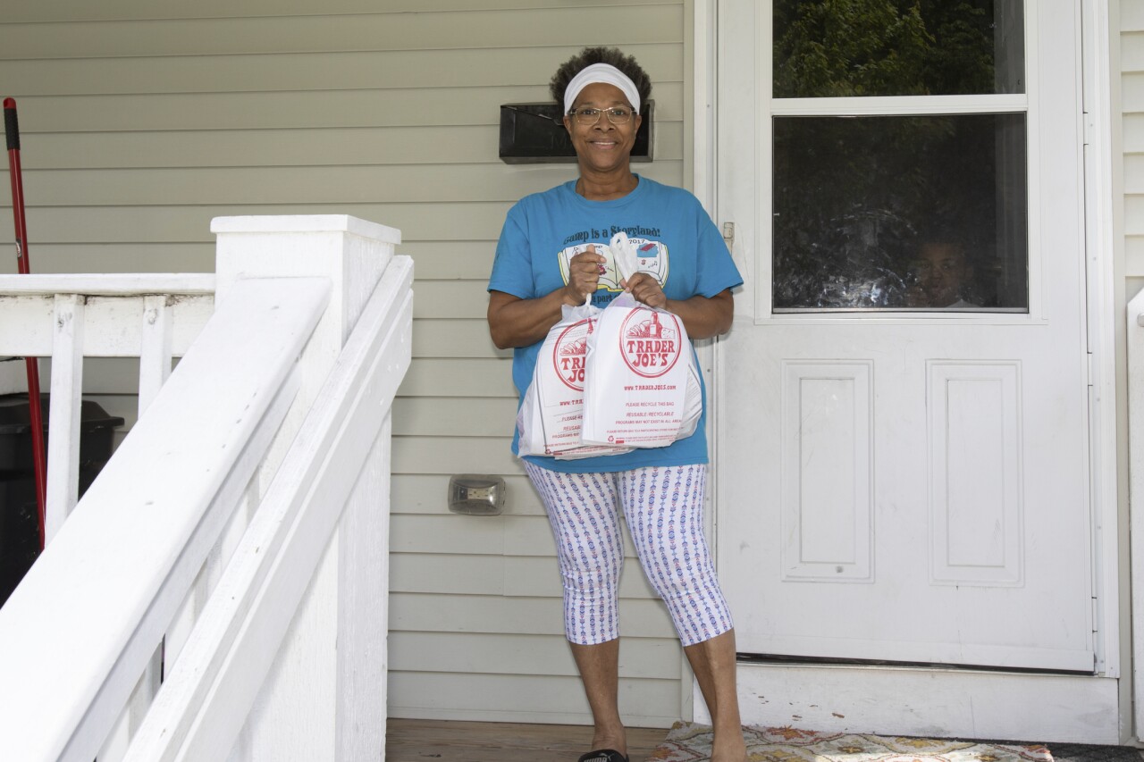 Priscilla Morgan poses for a photo after receiving food and supplies. Photo credit: Dan Herda, United Way
