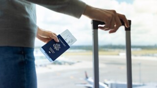 Traveler,At,Airport,,Us,Passport,Holder,Traveling,By,Plane