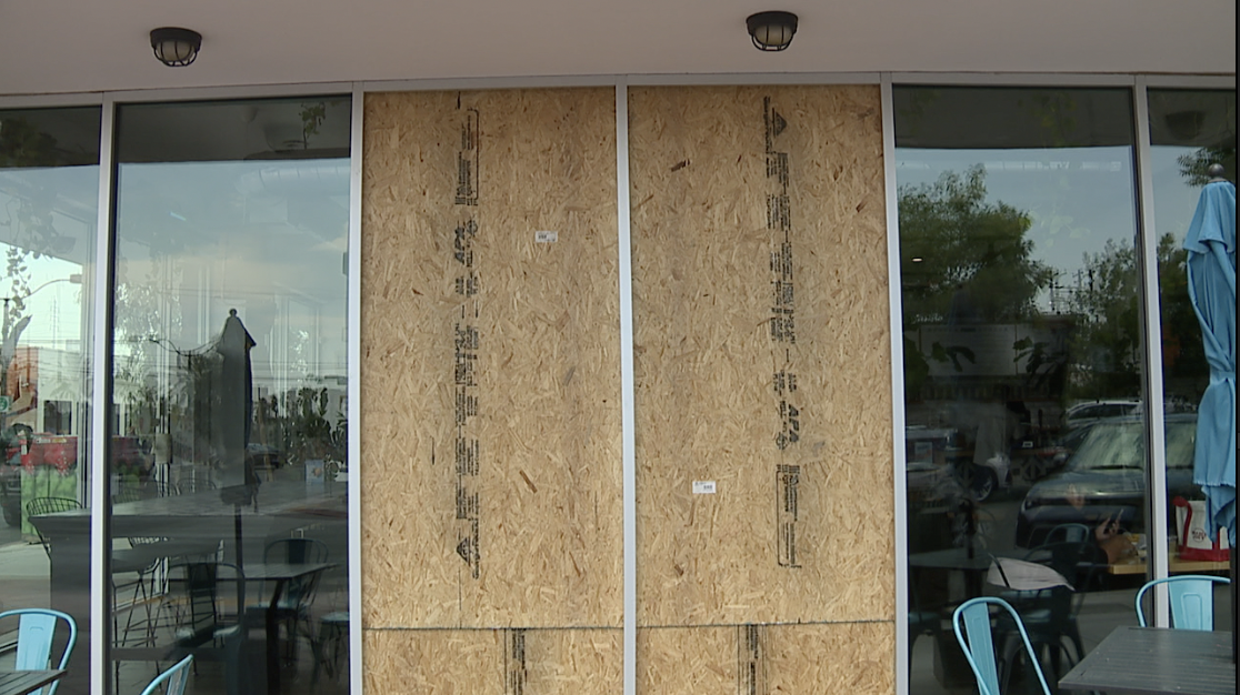 Boarded up windows outside Tacotarian