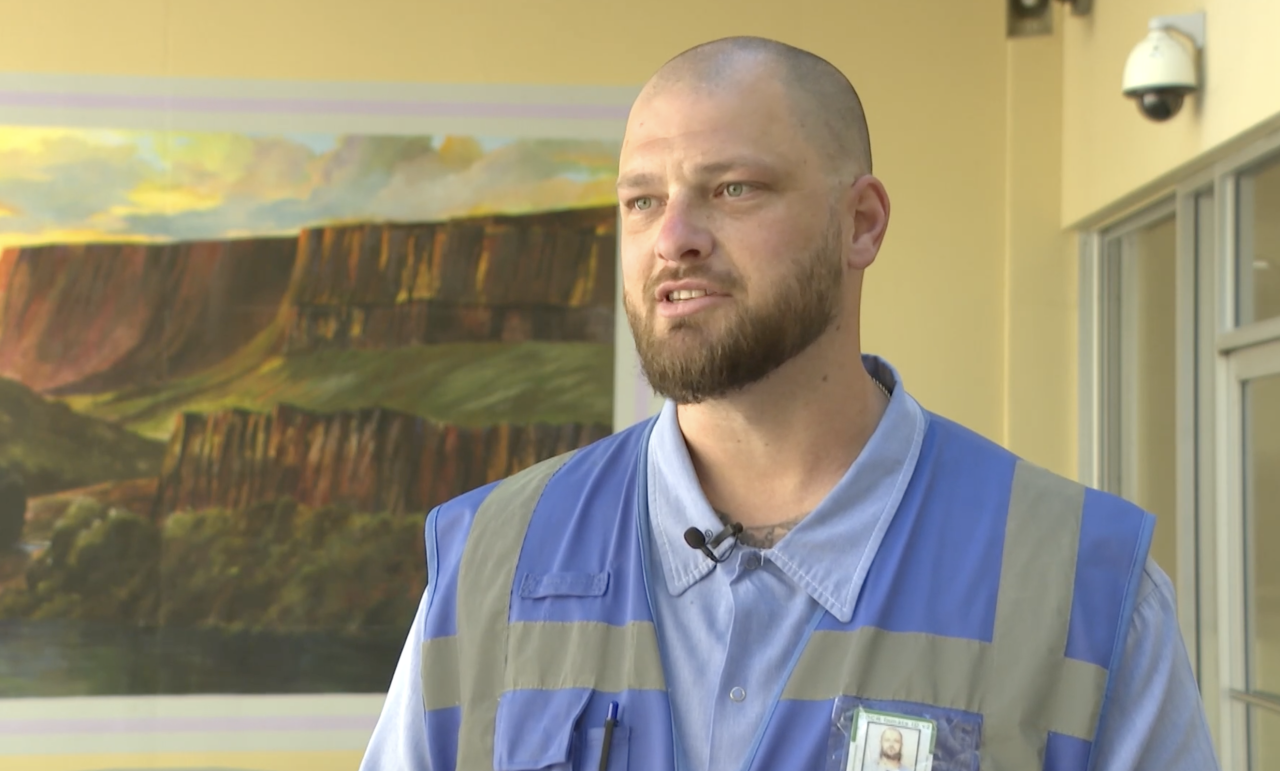 Collin Davis is an Inmate Assistance Dog Training Handler.png