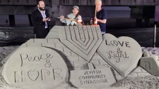 Jewish Community Synagogue menorah sand sculpture.png