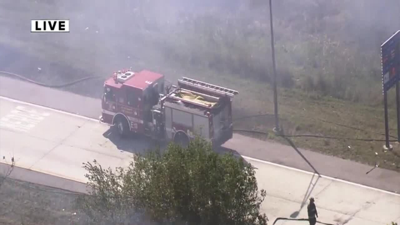 PHOTOS: Brush fire closes I-275 and Gand