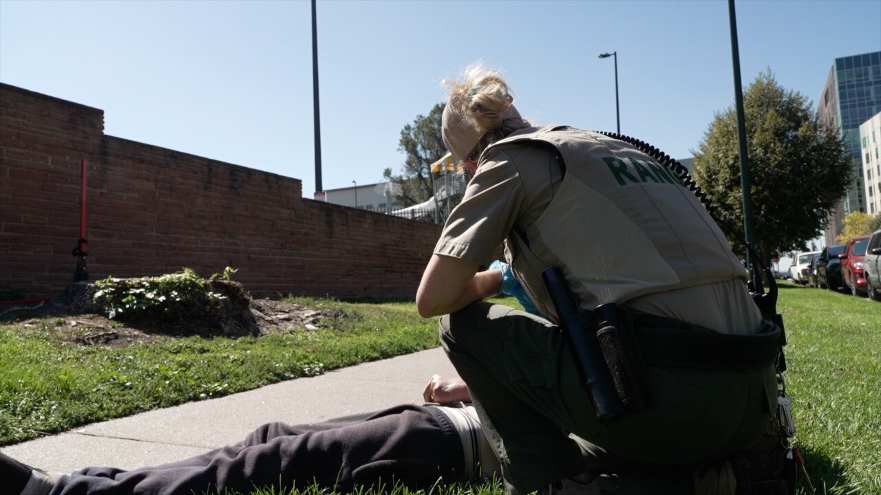 Jodie checking on man in park.jpg