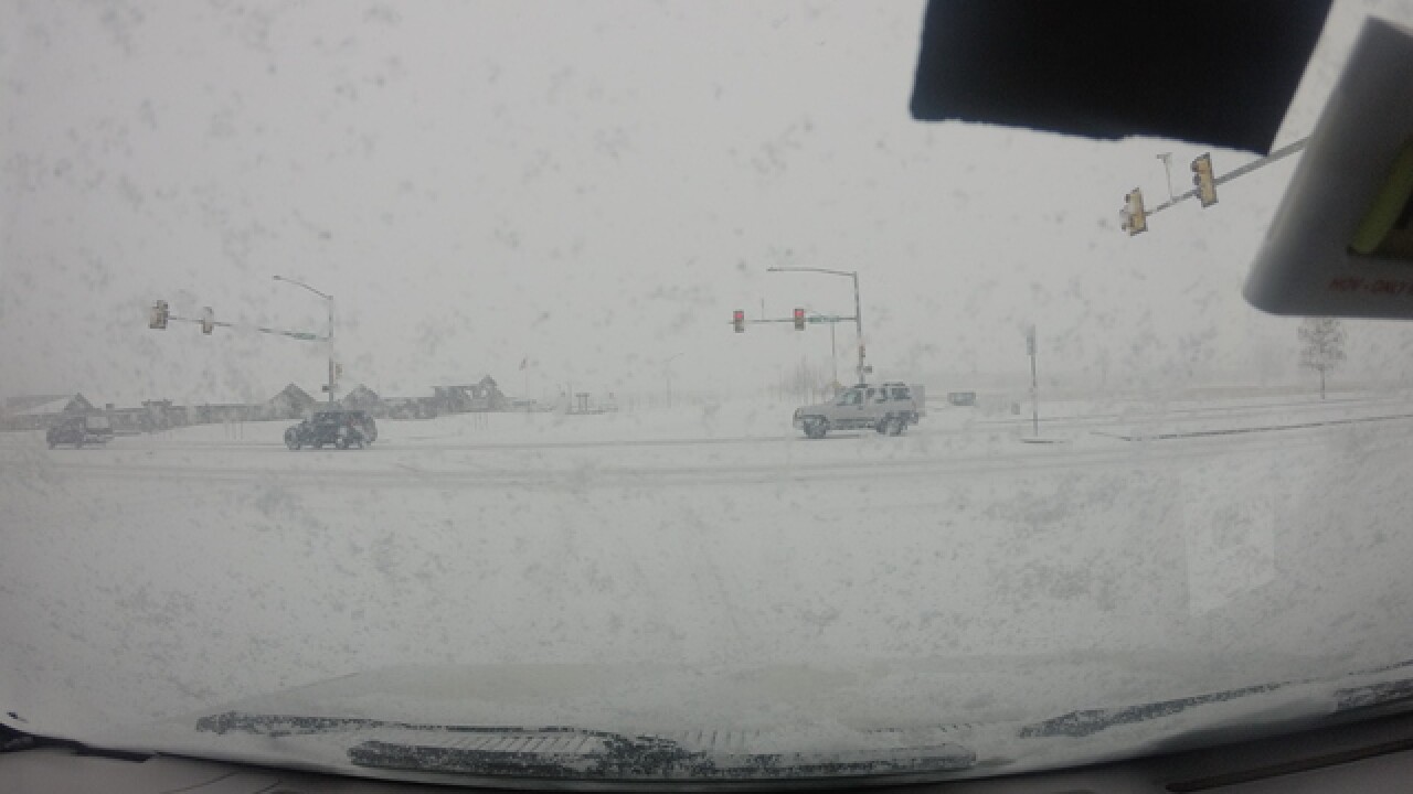PHOTOS: Snow, freezing rain cause problems