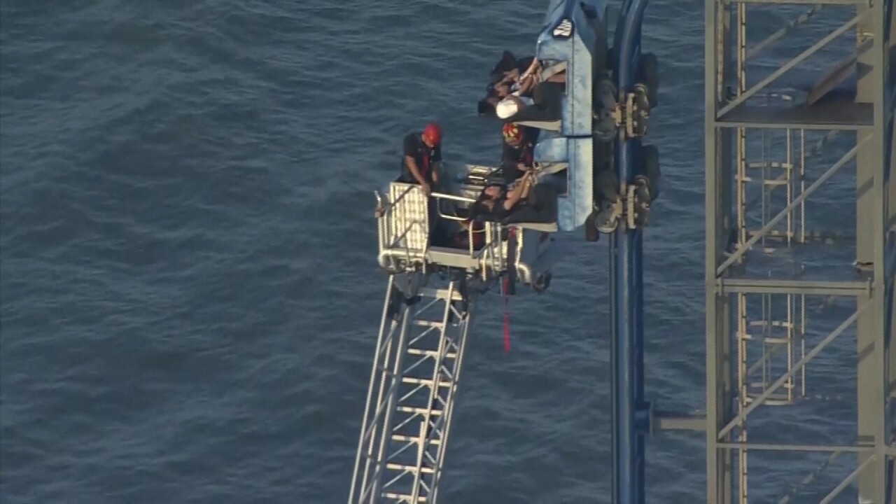 RIDERS RESCUED FROM GALVESTON ROLLER COASTER