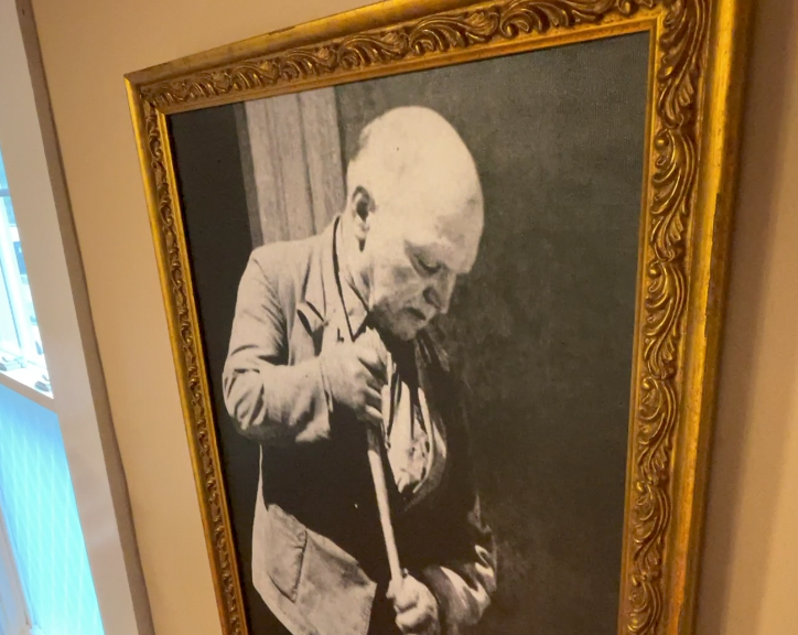 This portrait of the Serenelli Project's namesake, who went to prison for killing and trying to rape an 11-year-old girl, hangs in the program's chapel.