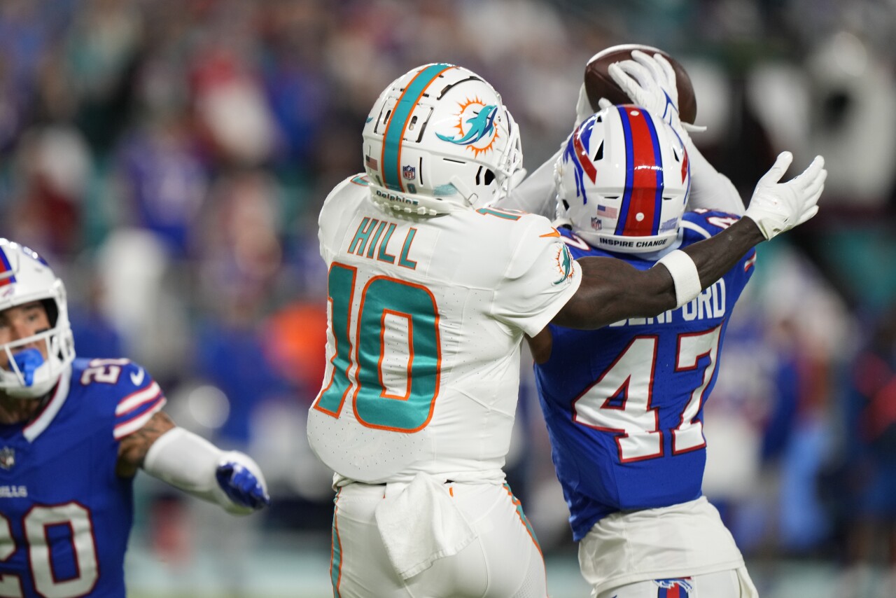 Buffalo Bills cornerback Christian Benford intercepts pass intended for Miami Dolphins receiver Tyreek Hill in first quarter of 'Sunday Night Football' game, Jan. 7, 2024