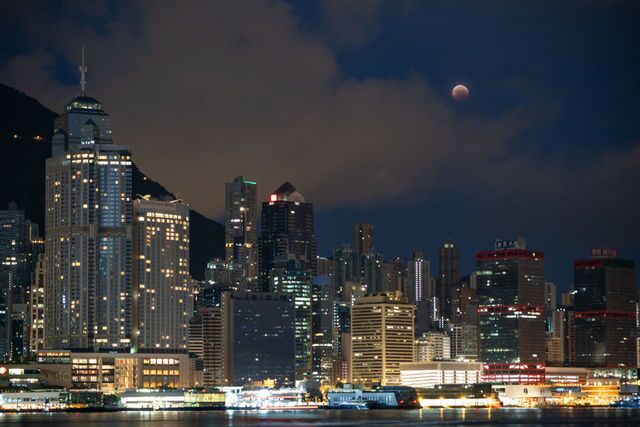 Photos: Lunar eclipse offers thrilling views of 'blood moon' across the world