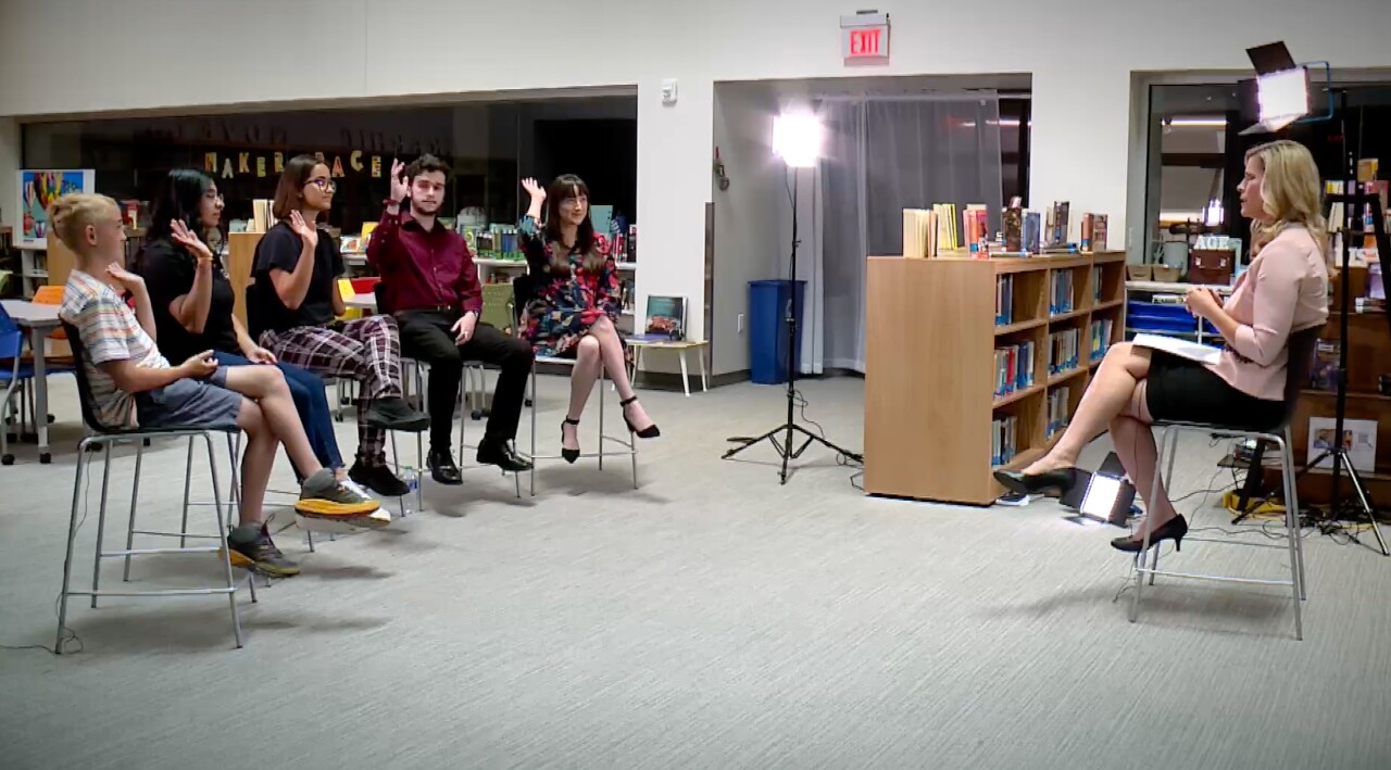 Roundtable Raised Hands.jpg