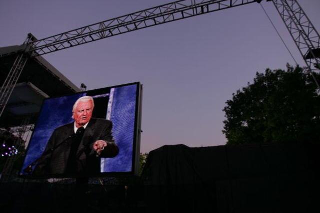 Billy Graham: See photos from pastor's sermons through the years