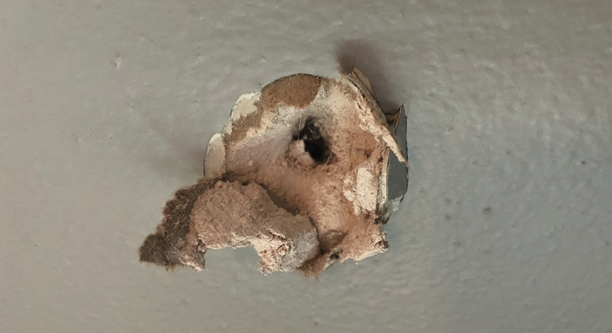 bullet in keys home wall