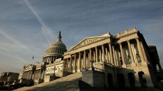 The early morning sun strikes the U.S. Capitol November 6, 2006 in Washington, DC. Midterm elections take place November 7, potentially changing the balance of power in the nation's capital. (Photo by Win McNamee/Getty Images)