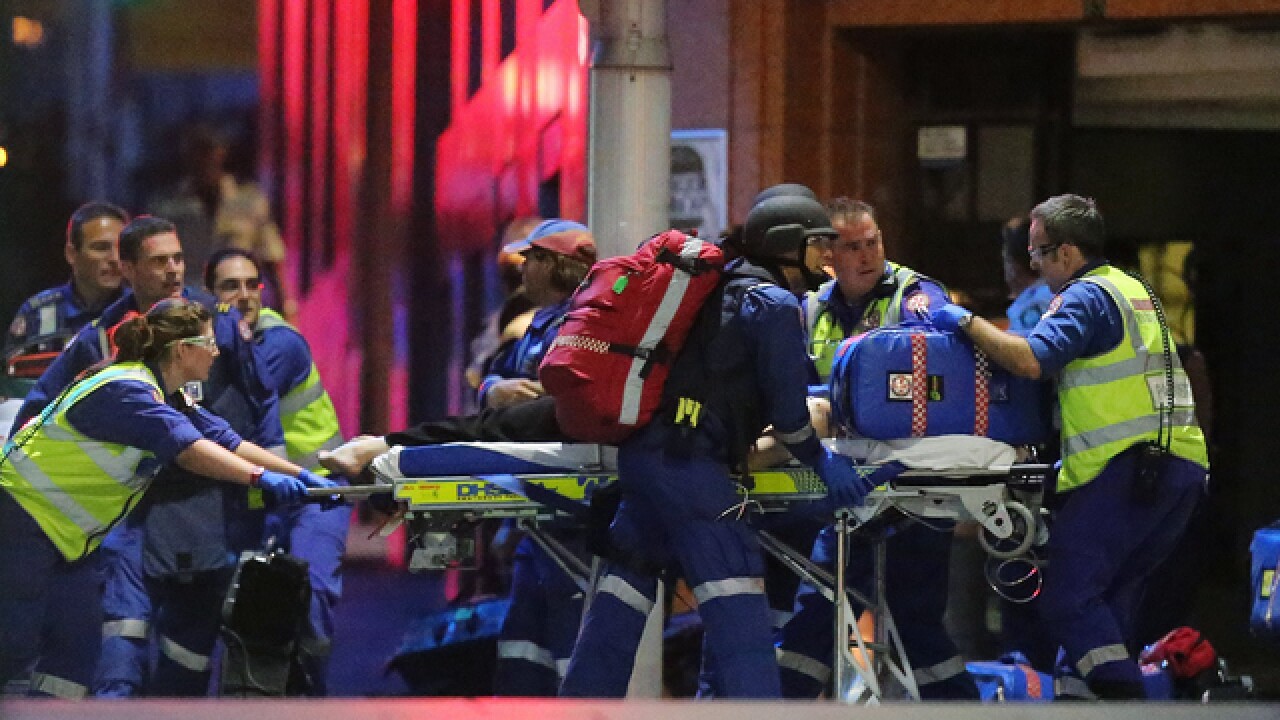 PICS: Standoff at Sydney cafe