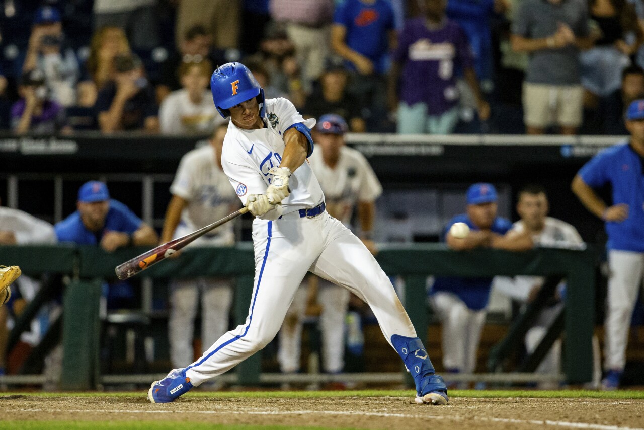 Florida Gators batter Luke Heyman hits sacrifice fly for walkoff win against Virginia in 9th inning of College World Series, June 16, 2023