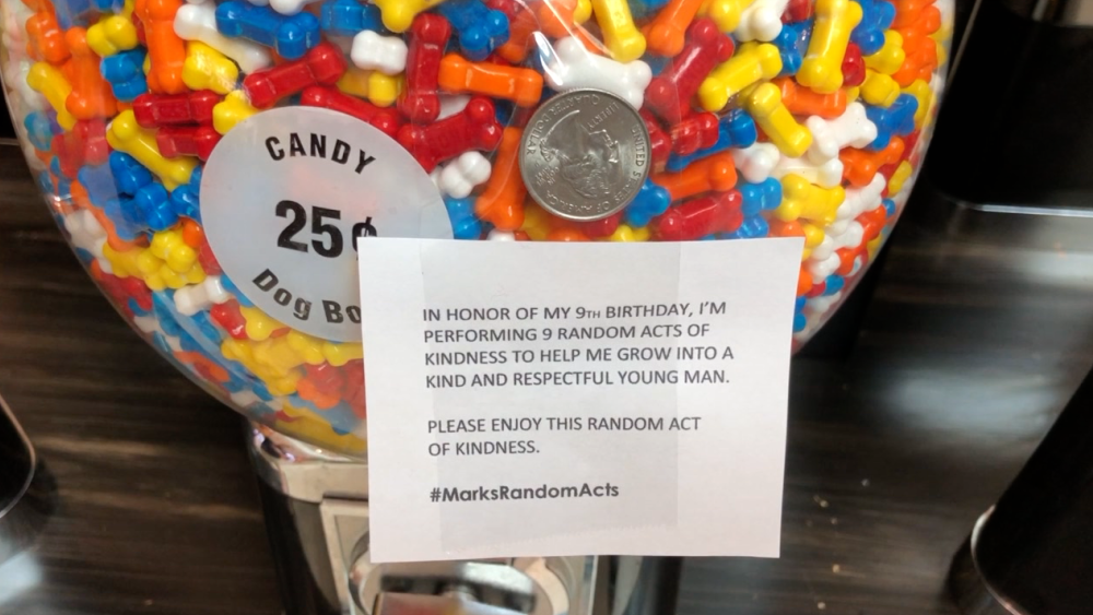Mark Effron leaving quarters on candy machine 2