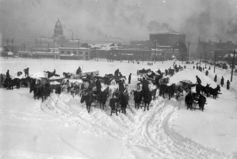 City_Teams_Unloading_Snow_on_Civic_Center.jpg