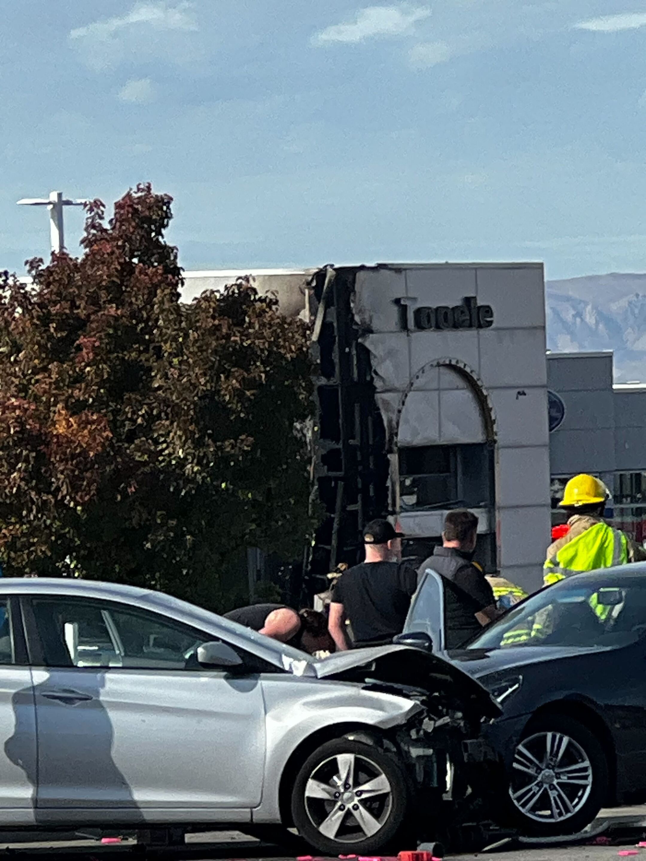 VIDEO Semitruck crashes into Tooele car dealership, causing massive fire