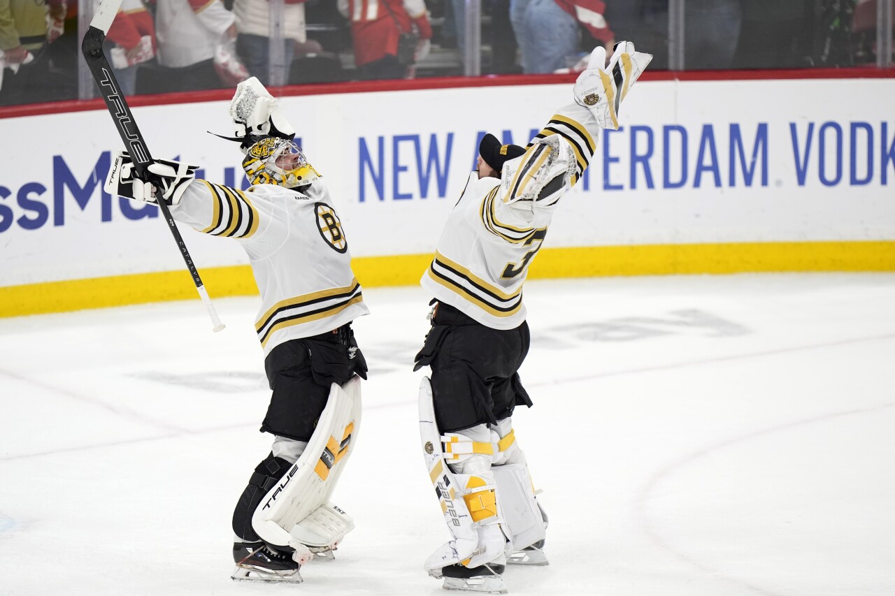 Boston Bruins goaltenders Jeremy Swayman and Linus Ullmark celebrate after beating Florida Panthers, May 14, 2024